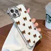 La funda de teléfono más vendida de Tk Station estilo Ins, con forma de corazón marrón y lazo, simple, electrochapada, con airbag, para iPhone 17 Pro
