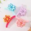 Pinza para el pelo de Flor de Frangipani Colorida Linda de Venta Caliente Transfronteriza Pinza de Tiburón de Gama Alta Pinza de Moda Dulce Elegante para Mujeres