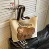 2024 Tailândia Nova Bolsa de Ombro de Lona Versátil para o Dia a Dia Bolsa Tote Fofa de Grande Capacidade Mochila Escolar para Estudantes Bolsa Tote