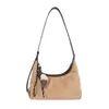 Bolsa de bolinho de design nicho com temperamento transfronteiriço 2026 inverno novo elegante moderna versão coreana ins chique bolsa de ombro único