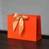 Em estoque embalagem laço de presente comércio exterior sacola de papel portátil conjunto sacola de papel para compras logo imprimível fabricante postagem