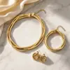 Juego de tres piezas de joyería de cadena de hueso de serpiente multicapa transfronteriza europea y americana, collar retorcido de moda, pulsera y pendientes de doble anillo para mujer