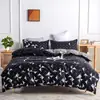 Juego de ropa de cama de tres piezas simple listo para exportación transfronteriza (funda de edredón y fundas de almohada) desde la fábrica de origen de Nantong