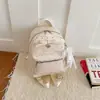 Bolsa de Costas Dupla com Laço de Bolinhas Transfronteiriça Feminina Pequena Nova Moda Verão 2026 Versátil Diária Compras na Rua Mochila Pequena