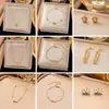 [Collar + Pulsera + Pendientes] Diseño de Nicho Personalizado Europeo y Americano Transfronterizo Conjunto de Joyería de Acero de Titanio Estilo Frío Venta al por Mayor