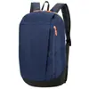 Mochila a color en stock, impermeable, ligera, de gran capacidad para viajes al aire libre, mochila escolar unisex para estudiantes, entrega directa al por mayor