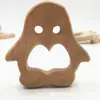 Suministro directo de fábrica palo para morder dientes de bebé Madera de haya diente calmar forma de animal palo para morder dientes morder música