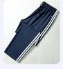 Uniforme Estudiantil Pantalón Deportivo de Una Raya Dos Rayas Holgado Transpirable para Escuela Secundaria Hombres y Mujeres Recto Casual Pantalones de Uniforme