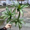 Nueva fábrica de plantas verdes de bambú y lirio de simulación, hojas de baniano, hojas de rosa, hojas ricas, camino de boda, flores falsas, fábrica al por mayor