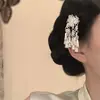 Rima Antigua Traducción ModernaNuevo Exquisito Estilo Étnico Pasador de Pelo con Borla de Plata Miao para Mujer Nuevo Estilo Chino Pin Lateral Adorno de Cabeza Hanfu