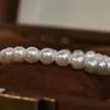 HEIY BAI Pulsera de Perlas Artificiales Retro Francesa Pulsera Completamente de Perlas Pulsera de Temperamento Elegante Hilo Simple para Mujer