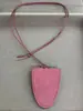 Collar con colgante ovalado de cuero transfronterizo, lujo ligero, alta gama, moderno, cadena para suéter simple, accesorio de nicho con diseño único