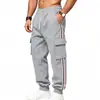 2026 Transfronterizo estilo americano invierno resistente forrado de polar cálido deportes al aire libre de moda ropa de trabajo retro holgado pants de chándal con cincha