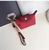 Bolsa Mini Compacta para Empanadas Bolso de Labial, Auriculares y Llaves de Nicho Bolsa de Almacenamiento Portátil Decorativa Simple