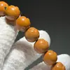 Pulsera de bola de gato tallada con cabeza de mono de alta calidad, lisa y en buen estado, alto contenido de aceite, alta densidad, fácil de manejar, adecuada tanto para hombres como para mujeres, disponible al por mayor y envío directo