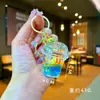 Colgante llavero temática oceánica, diseño de caballito de mar y estrella de mar en acrílico, llavero creativo de arena líquida brillante, pequeño regalo