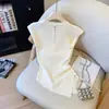 Camiseta sin mangas irregular con cordón para mujer 2025 Verano Nueva Espalda Hueca Sentido del Diseño Ajustada Top Corto