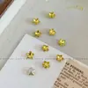 Pedras de strass para manicure douradas, modernas e deslumbrantes, apresentando designs de floco de neve, estrela de cinco pontas e cristal de vidro redondo com base pontiaguda, usadas como acessórios decorativos