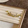Pendientes de botón redondos de circonita chapados en oro real de 14 quilates, lujo ligero, alta gama, modernos y exquisitos, pendientes simples y versátiles para mujer