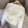 Suéter rosa de intrincado patrón de ganchillo estilo coreano para mujer, otoño e invierno, ajuste ceñido, adelgazante, de longitud corta, manga larga