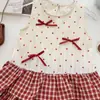 Vestido de Verano para Niñas 2026 Nuevo Vestido de Tirantes de Lunares Franceses con Lazo Vestido Pastel para Niña Pequeña para Exportación