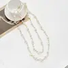 Colección Larga de Collares Superpuestos de Perlas Swarovski para Mujer, Estilo Lujo Ligero, Cadena Versátil para Suéter con un Toque de Alta Gama, Venta al por Mayor Otoño e Invierno