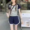 Versão coreana de shorts casuais de manga curta soltos, traje esportivo casual para corrida, conjunto de duas peças feminino, verão, estudante, traje esportivo, atacado, comércio exterior