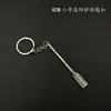 8cm Notas de Tomb Raider Pala de Luoyang Piolet Hacha Pala Modelo de Metal Gadget de Aleación Adorno Llavero