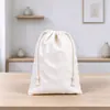 Bolsa de cordón con fondo plano impresión personalizada algodón y lino cordón bolsa pequeña de tela joyería pendientes bolsa de almacenamiento de regalos disponible para venta al por mayor