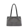 Bolso de mano nuevo para mujer, gran capacidad, versátil para el uso diario, de alta gama, adecuado para ir al trabajo, hecho de gamuza, bolso de hombro, bolso tote, diseño de nicho