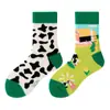 Calcetines originales de moda infantil AB color asimétrico dibujos animados longitud media otoño e invierno caramelos lindos calcetines de algodón para niños y niñas