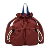 Bolsa feminina mini nuvem ultraleve estilo japonês transfronteiriça 2026 início do outono leve com cordão bolsa de mão casual mochila