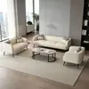 Sofá moderno minimalista de cuero tecnológico de contraste naranja y blanco en fila recta Sofá de cuero de tres plazas de lujo ligero italiano para sala de estar de apartamento pequeño