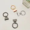 Accesorios Llavero de Coche Anilla de Resorte de Aleación de Zinc Marca de Moda Campana Accesorios de Ferretería Fabricante de Joyería DIY Venta al por Mayor