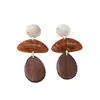 Pendientes transfronterizos de color marrón caramelo intenso con detalles de resina, pendientes de botón exagerados de estilo Maillard marrón vintage, de nicho europeo y americano, para mujer