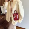 Bolso de Teléfono Móvil de Moda con Textura de Gama Alta para Mujer Otoño e Invierno 2025 Nuevo Popular Bolso de Papas Fritas de un Solo Hombro Bolso Cruzado Pequeño Versátil