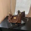Bolso pequeño retro estilo coreano transfronterizo para mujer, nuevo bolso cruzado versátil otoño e invierno 2026, bolso de hombro y axila moderno y súper popular
