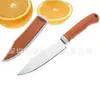 Loja de dois yuan loja de departamento faca amarela doméstica com viagem faca portátil cortando fruta descascando aço inoxidável faca de fruta atacado