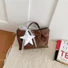 Bolso de mano estilo coreano para mujer, adecuado para el trabajo y los desplazamientos, nuevo bolso cruzado casual de principios de otoño 2026, bolso de hombro y para debajo del brazo a la moda