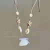 Nos vemos en el mar ~ collar de conchas con cuentas de dopamina diseño nicho para niñas cadena para la clavícula accesorios de estilo vacacional de verano