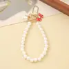 Nuevo Cordón para Teléfono Móvil Pulsera de Perlas con Lazo para Mujer Ins Moda Simple Boutique Aroma Pequeño Cuentas Hechas a Mano
