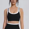 Nuevo sujetador deportivo de dos piezas falsas transfronterizo con sensación de segunda piel, sujetador de yoga de secado rápido con bloques de color, prenda exterior para correr y fitness, top para mujer