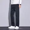Calça casual masculina, novo modelo de outono, corte reto slim, cintura média semi-elástica, estilo business leve, calça longa reta para homens