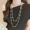 Collar de Perlas Shijia en Capas de Moda para Mujer, Cadena Larga Versátil para Suéter Otoño e Invierno, Lujo Ligero de Nicho, Popular Accesorio de Ropa