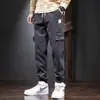 Macacão de comércio exterior marca de moda masculina primavera, outono e inverno solto estilo harém com amarrilho no tornozelo esportivo forrado com fleece espessado casual calça comprida masculina