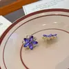 Pendientes de Plata de Aguja Estilo Nuevo con Pétalos Morados Incrustados de Diamantes para Mujer, Diseño de Nicho Versátil y Único con un Toque de Alta Gama