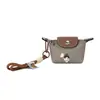 Mini Bolso Lindo para Mujer con Diseño de Nicho, Bolso Dumpling, Monedero, Portamaquillaje, Estuche para Auriculares, Llavero, Colgante para Bolso, Bolso Croissant