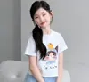 Conjunto de Camiseta de Verano para Niña con Cordón en la Espalda y Falda de Gasa a Cuadros 2026 Nuevo Moda Manga Corta para Niñas