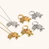 Joyería de Acero Inoxidable, Nuevo Estilo Popular Europeo y Americano, Pendientes Colgantes, Collar, Anillo de Rana y Palmera Chapados en Oro de 18 Quilates de Nicho