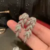 Pendientes de Hoja con Circonita Micropavimentada Estilo Nuevo 2025, Pendientes Largos Femeninos, Pendientes Brillantes Populares Europeos y Americanos, Modernos